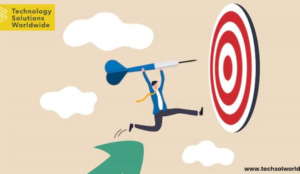 small-man-carrying-the big-dart-to-reach-dartboard